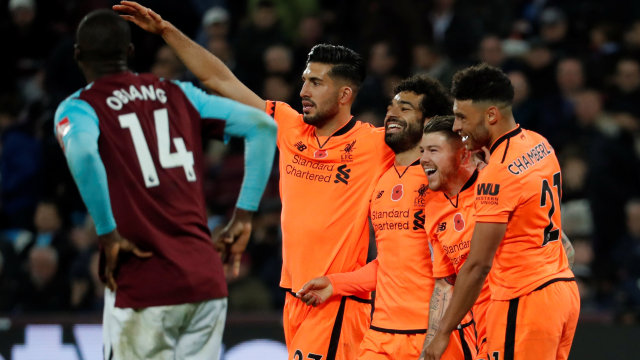 Para pemain Liverpool merayakan gol. (Foto: REUTERS/Eddie Keogh)