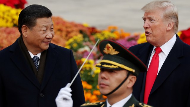 Donald Trump dan Presiden China Xi Jinping Foto: Reuters/Damir Sagolj