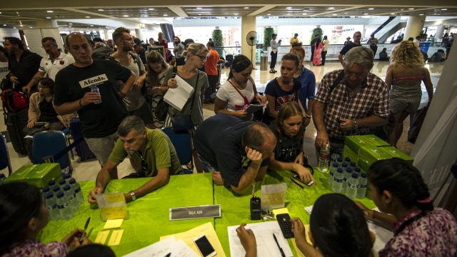 Suasana Bandara I Gusti Ngurah Rai (Foto: JUNI KRISWANTO / AFP)