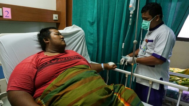 Yudi Hermanto (33) tubuhnya membengkak. (Foto: Iqbal FIrdaus/kumparan)