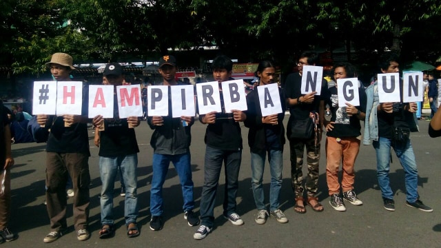 Aksi memperingati Hari HAM (Foto: Paulina Herasmaranindar/kumparan)