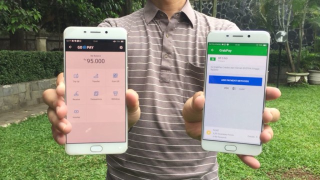Layanan e-money GoPay dan GrabPay. Foto: Bianda Ludwianto/kumparan