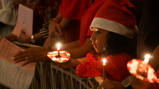 Pelaksanaan ibadah Misa Natal di Gereja Imanuel. (Foto: Fanny Kusumawardani/kumparan)
