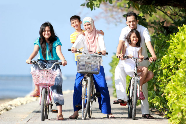 com-Keluarga Bersepeda (Foto: Thinkstock)