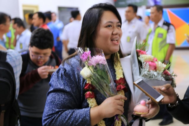 Wisatawan pertama 2018 di bandara Soetta. (Foto: Muhammad Iqbal/kumparan)