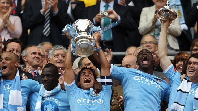 Man City saat menjuarai Piala FA pada 2011. (Foto: Adrian Dennis/AFP)
