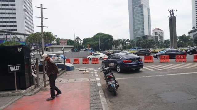 Pemotor kembali melintasi jalan MH. Thamrin (Foto: Fitra Andrianto/kumparan)