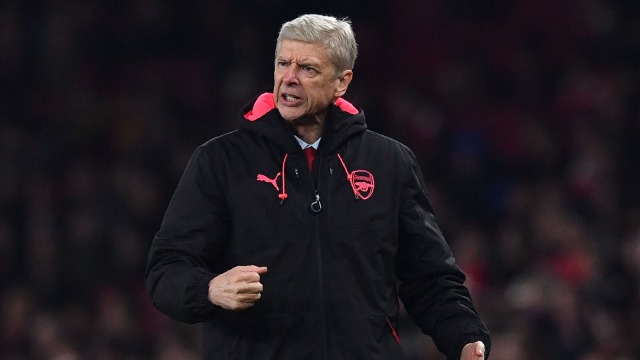 Wenger pada pertandingan di Liga Europa. (Foto: Ben Stansall/AFP)