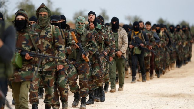 Pasukan FSA membantu Turki di Suriah (Foto: REUTERS/Osman Orsal)
