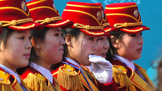 Pemandu Sorak Korea Utara (Foto: AFP/Jung Yeon-Je)