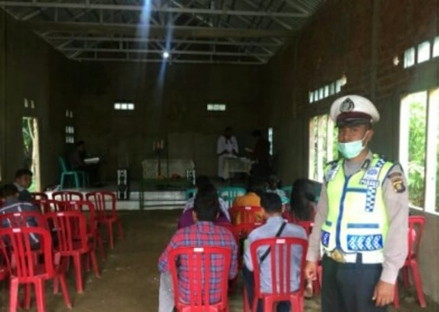 Polisi Beri Kenyamanan Bagi Umat Nasrani dengan Program PASTI Setiap Minggu Pag (1)
