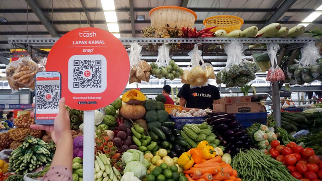 Pembayaran TCash pakai barcode. (Foto: TCash)