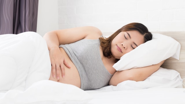 Ilustrasi ibu hamil tidur nyenyak. (Foto: Thinkstock)