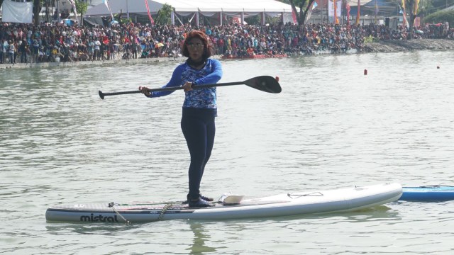 Susi saat lomba bersama Sandi. (Foto: Fanny Kusumawardhani/kumparan)