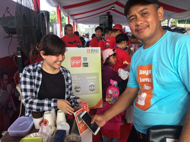 Branch Mgr. BNI membeli kopi dengan yap! (Foto: Kumparan)