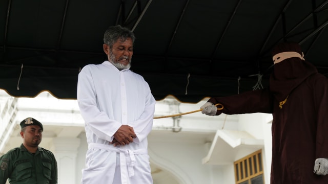 Eksekusi Hukum Cambuk Aceh (Foto: ANTARA FOTO/Irwansyah Putra)