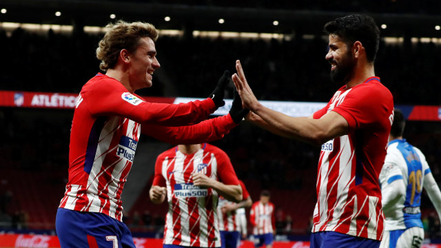 Selebrasi Griezmann dan Costa. (Foto: REUTERS/Juan Medina)