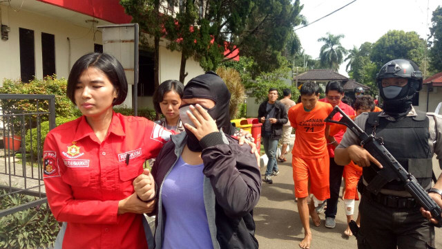 Rilis pembunuhan Justinus Sinaga di Polres Bogor. (Foto: Ainul Qalbi/kumparan)