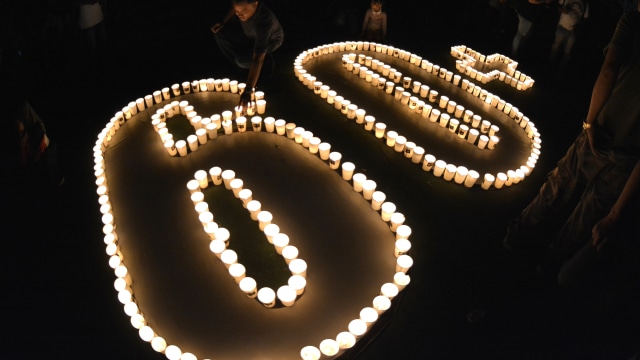 Earth Hour Kuta Foto: ANTARA FOTO/Fikri Yusuf