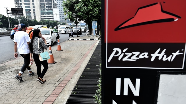 Pizza Hut. (Foto: AFP/Bay Ismoyo)