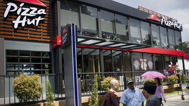 Pizza Hut. (Foto: AFP/Ye Aung Thu)