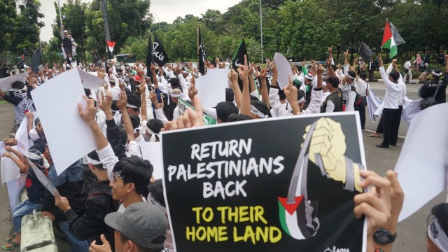 Aksi dukung Great Return March Palestina. (Foto: Nugroho Sejati/kumparan)