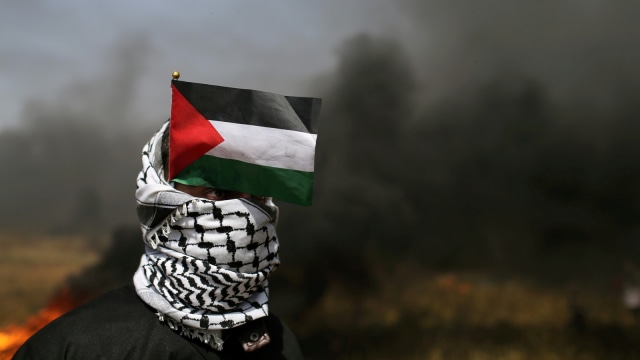 Demonstrasi di jalur Gaza. Foto: Reuters/Ibraheem Abu Mustafa