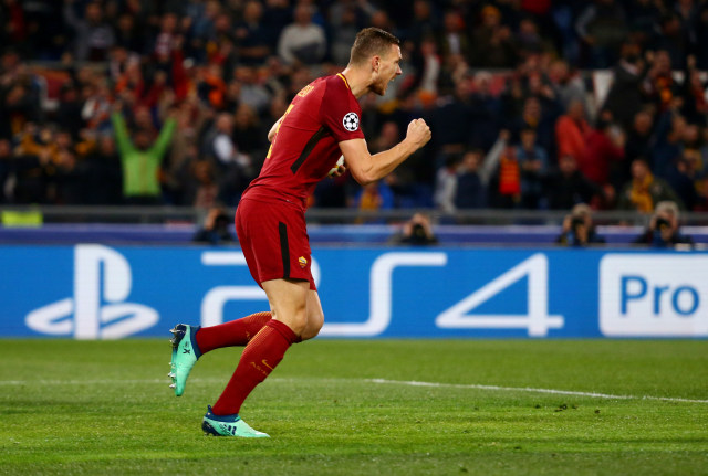 Edin Dzeko usai mencetak  gol. (Foto: REUTERS/Tony Gentile)