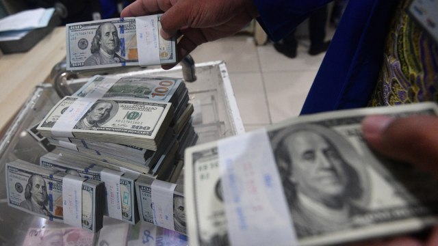 Ilustrasi uang dolar (Foto: ANTARA FOTO/ Sigid Kurniawan)