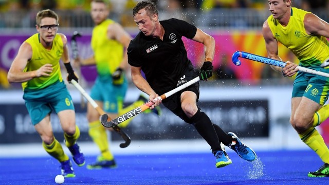 Laga hoki Australia vs Selandia Baru. (Foto: AFP/Manan Vatsyayana)