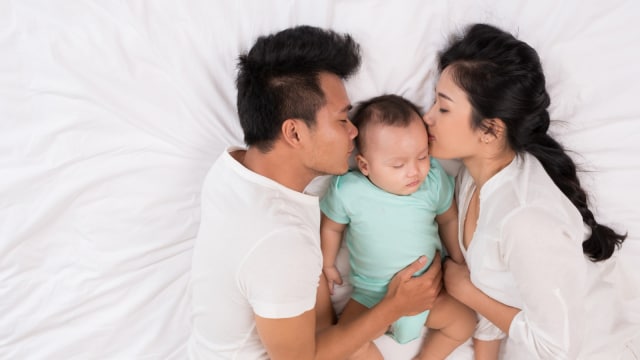 Ilustrasi Tidur Bersama Bayi. (Foto: Thinkstock)
