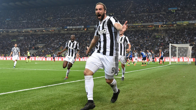 Higuain menangkan Juventus. (Foto: Reuters/Alberto Lingria)