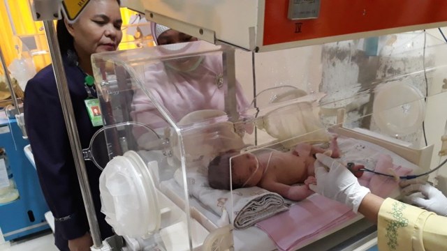 Penemuan bayi di Pancoranmas, Depok. (Foto: dok. Polsek Pancoranmas)