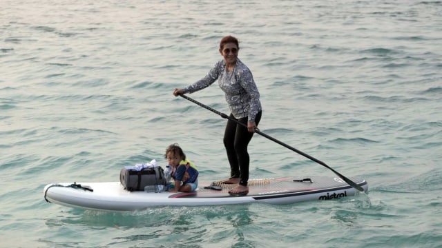 Susi Paddling dengan Anaknya Foto: Aditia Noviansyah/kumparan