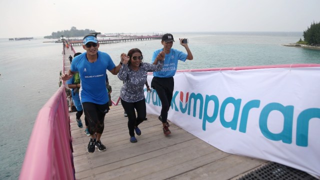 Susi dan Sandi di garis finish (Foto: Aditia Noviansyah/kumparan)