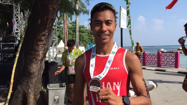 Jauhari Jonan, pemenang Tidung Aquathlon. (Foto: Arif Utama/kumparan)