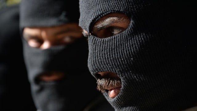 Ilustrasi Teroris (Foto: AFP/NOORULLAH SHIRZADA)