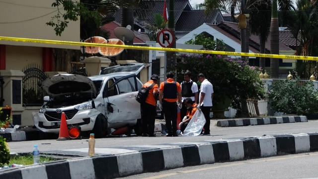 Serangan teroris. (Foto: AFP/DEDY SUTISNA)