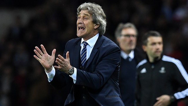 Pellegrini, manajer anyar West Ham. (Foto: FRANCK FIFE / AFP)