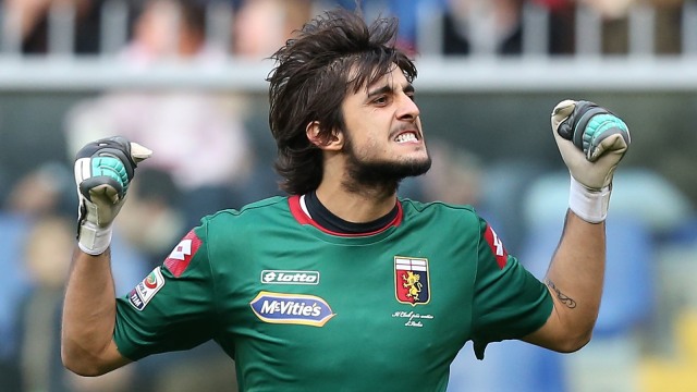 Aksi Mattia Perin di bawah mistar Genoa. (Foto: Marco Bertorello/AFP)