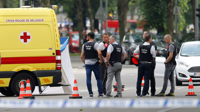Baku tembaka di Liege, Belgia (Foto: VICTOR JAY via REUTERS)