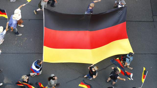 Ilustari Bendera Jerman (Foto: REUTERS/Hannibal Hanschke)