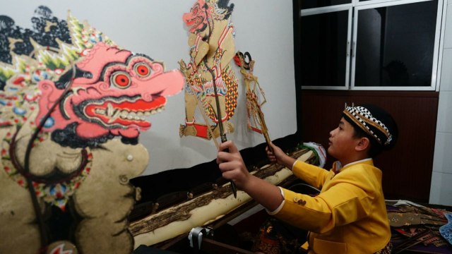 Pramariza Fadhlansyah, dalang cilik. (Foto: Nugroho Sejati/kumparan)