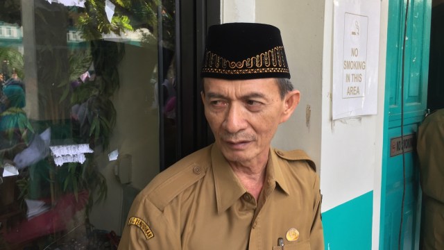 Kepsek SMP 11 Tanggerang Selatan, Nindin Komarudin. (Foto: Ferry Fadhlurrahman/kumparan)