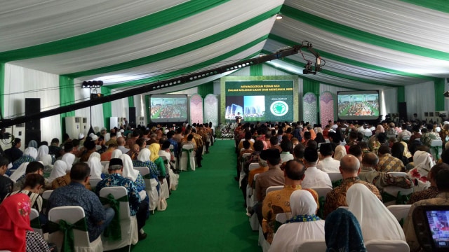 Jokowi hadiri Milad ke-43 MUI dan peletakan batu pertama Menara MUI. (Foto: Jihad Akbar/kumparan)