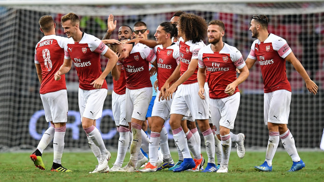 Para pemain Arsenal merayakan gol. (Foto: Thananuwat Srirasant/Getty Images)