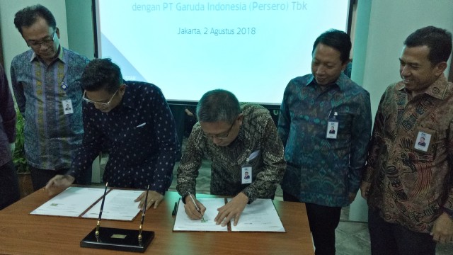 Penandatanganan kerja sama asuransi KIK EBA Garuda Indonesia dengan Askrindo. (Foto: Resya Firmansyah/kumparan)