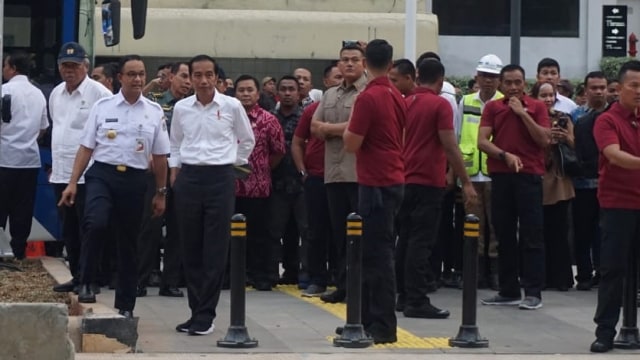 Presiden Joko Widodo bersama Anies Baswedan (Foto: Yudhistira Amran Saleh/kumparan)