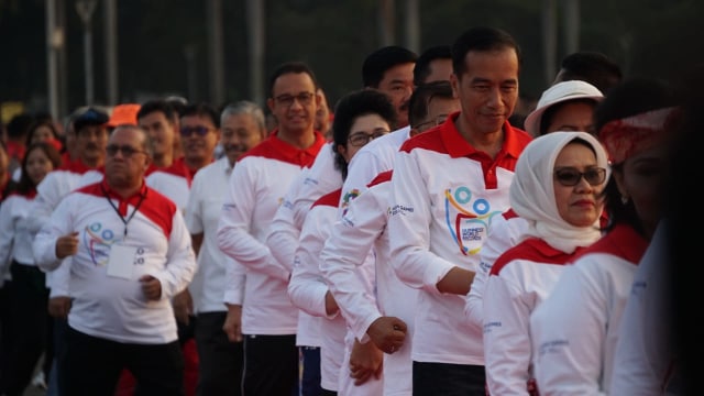 Pemecahan Rekor Dunia Menari Poco-Poco di Monas. (Foto: Jamal Ramadhan/kumparan)