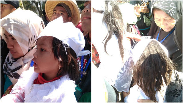 Pemotongan rambut hanya dapat dilakukan apabila permintaan anak-anak gimbal telah dipenuhi. (Foto: Dok. Aldio Mahadika)